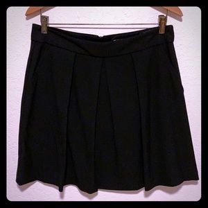 Trina Turk black pleated skirt, size 8